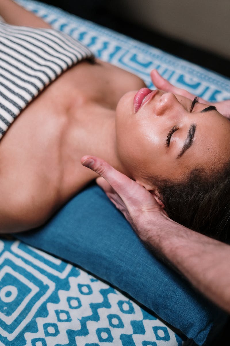 Indulge in a calming facial massage in a luxury spa setting, promoting relaxation and wellness.